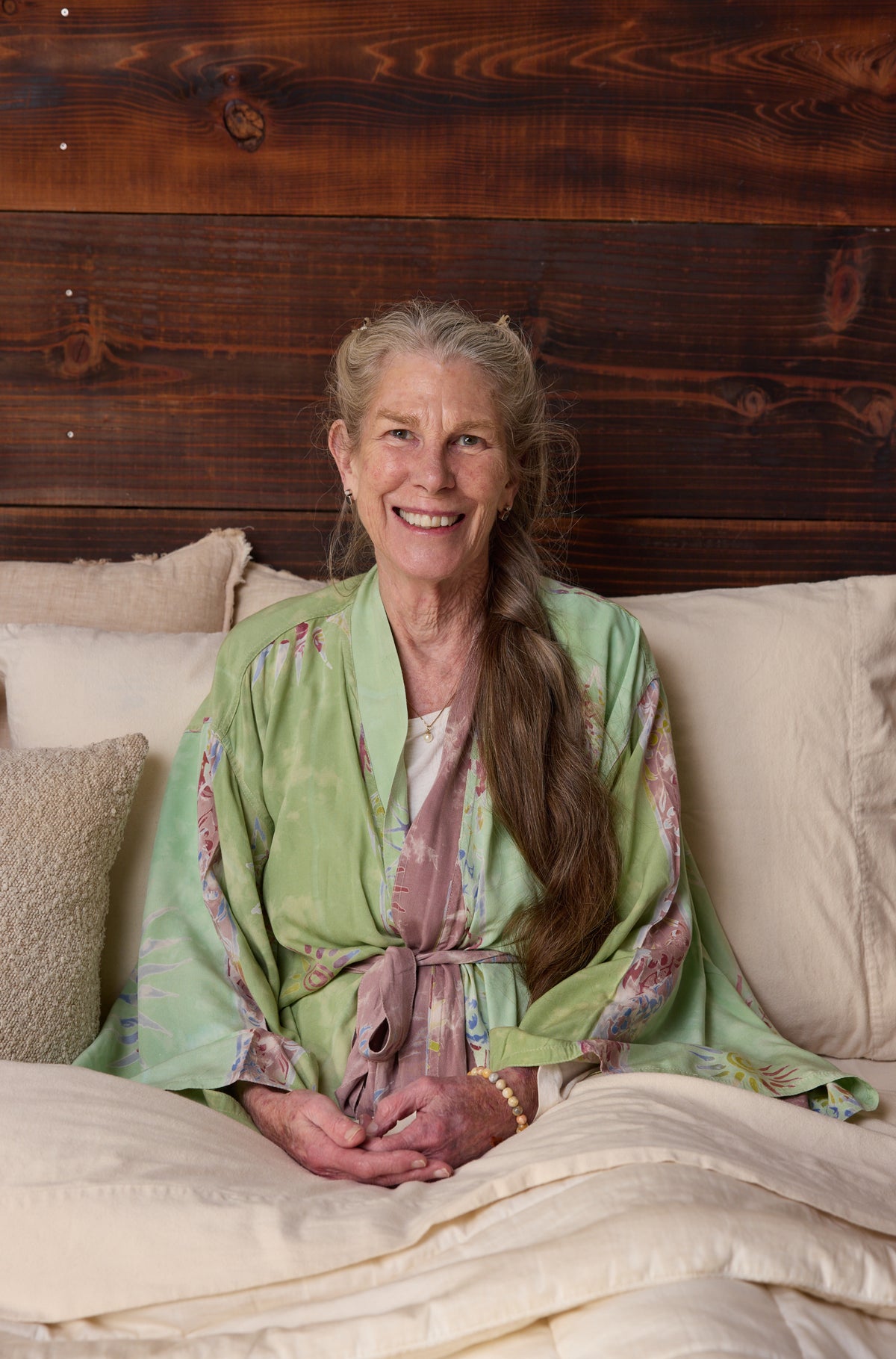 June smiling, resting in bed